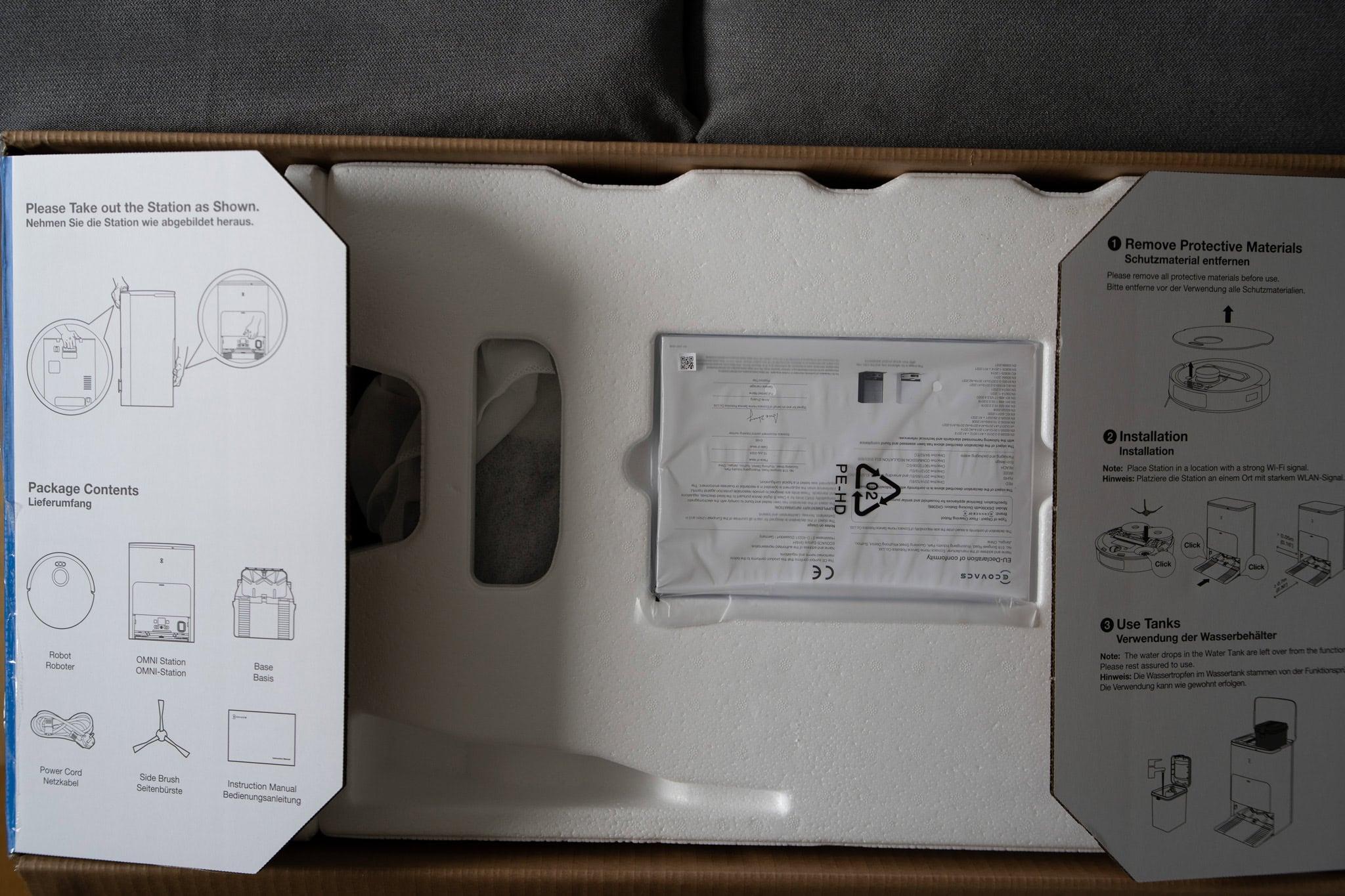 Fernseher- oder Smart Home-Produktverpackung mit Installationsanleitung und Komponenten, kompatibel mit Streaming, intelligenten Geräten und Hausautomatisierung.