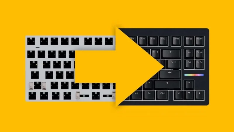 Ersatz-Keycaps für Tastatur auf grauem Metallrahmen, kompatibel mit mechanischen Tastaturen.