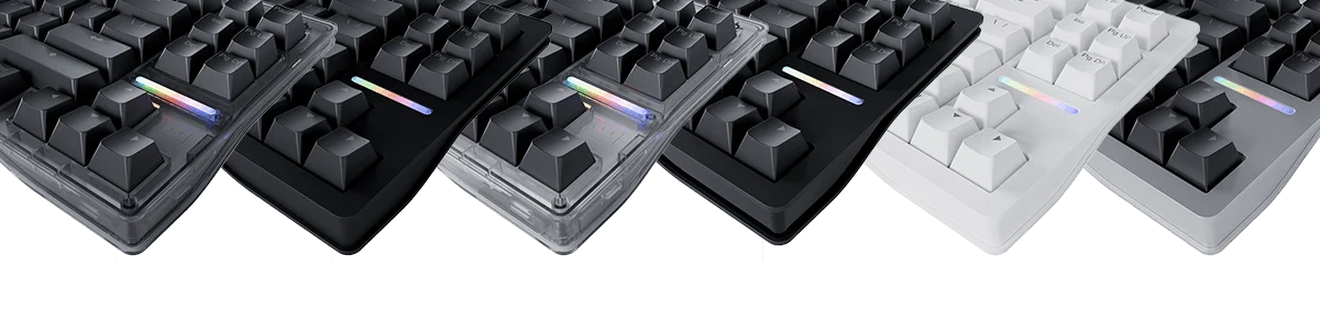 Wooting 80HE Test: Hall-Effect trifft Rapid Trigger – Gaming und Custom vereint? Verschiedene mechanische Tastaturen mit bunten Keycaps und RGB-Beleuchtung.